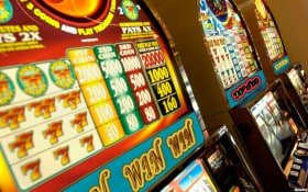 Play'n GO slot game displayed on mobile phone screen with responsive controls